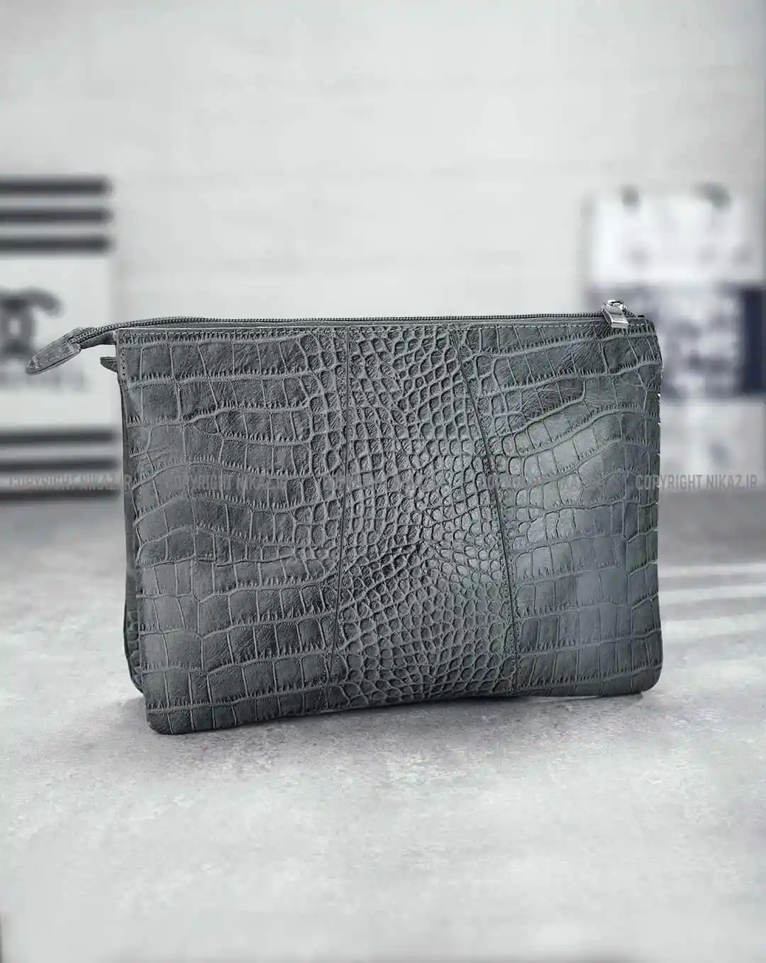 خرید کیف دوشی زنانه چرم طبیعی مدل پریان کد 1122 طوسی | نیکاز| فروش ساعتمچی،اکسسوری و کیف چرم